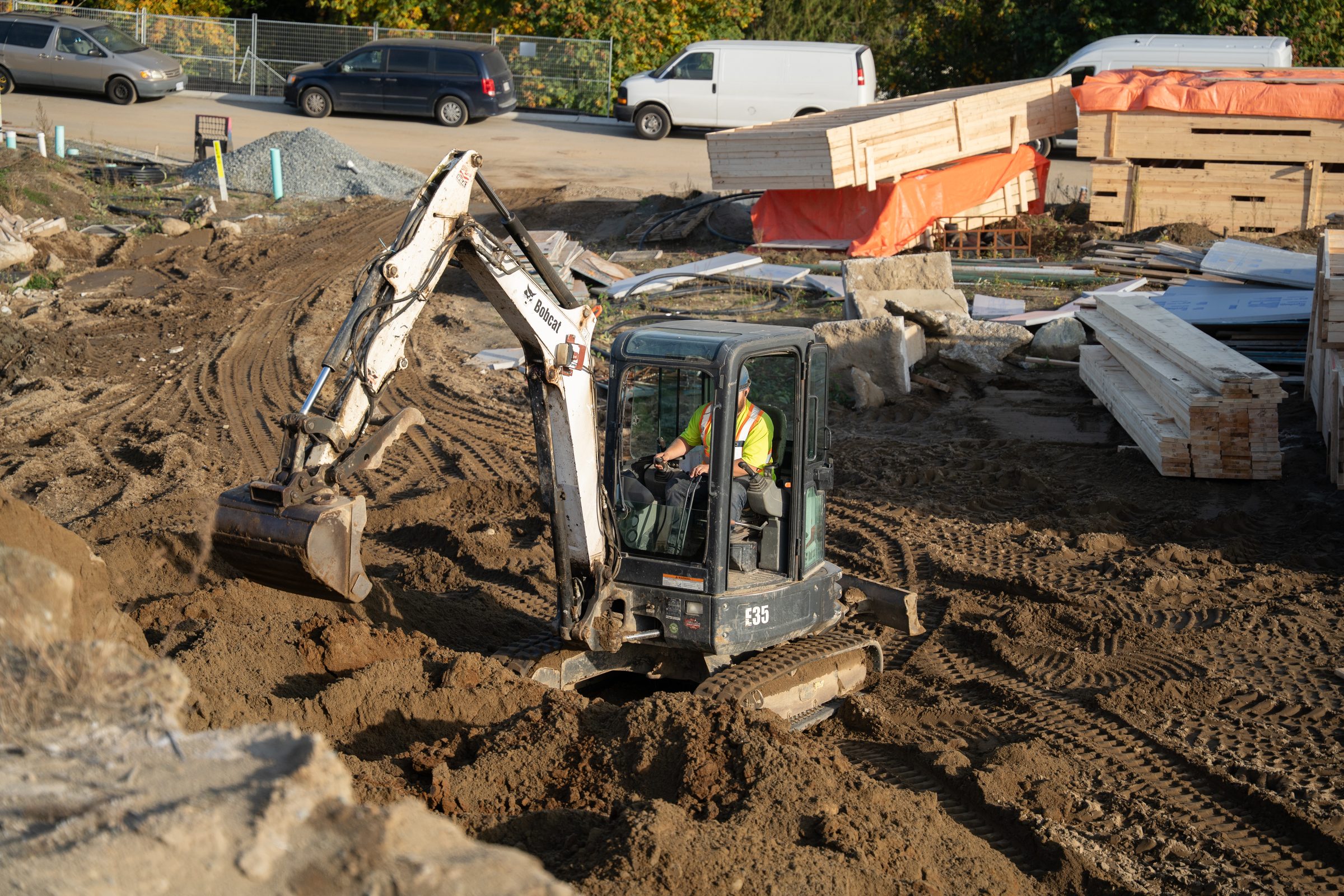 Excavator during site preparation on a BC Legacy townhouse project