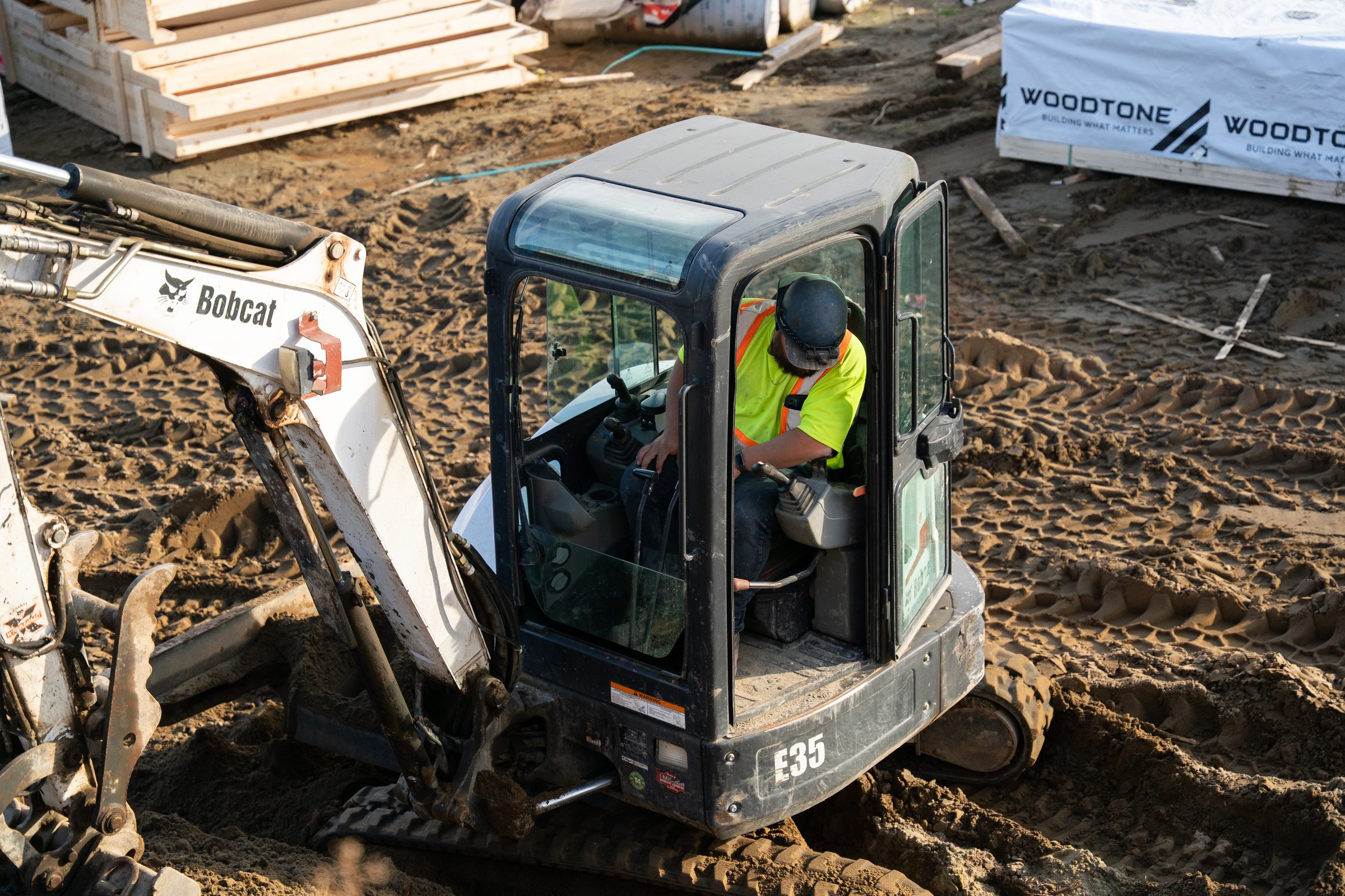 Excavator during site works on a BC Legacy multi-family project