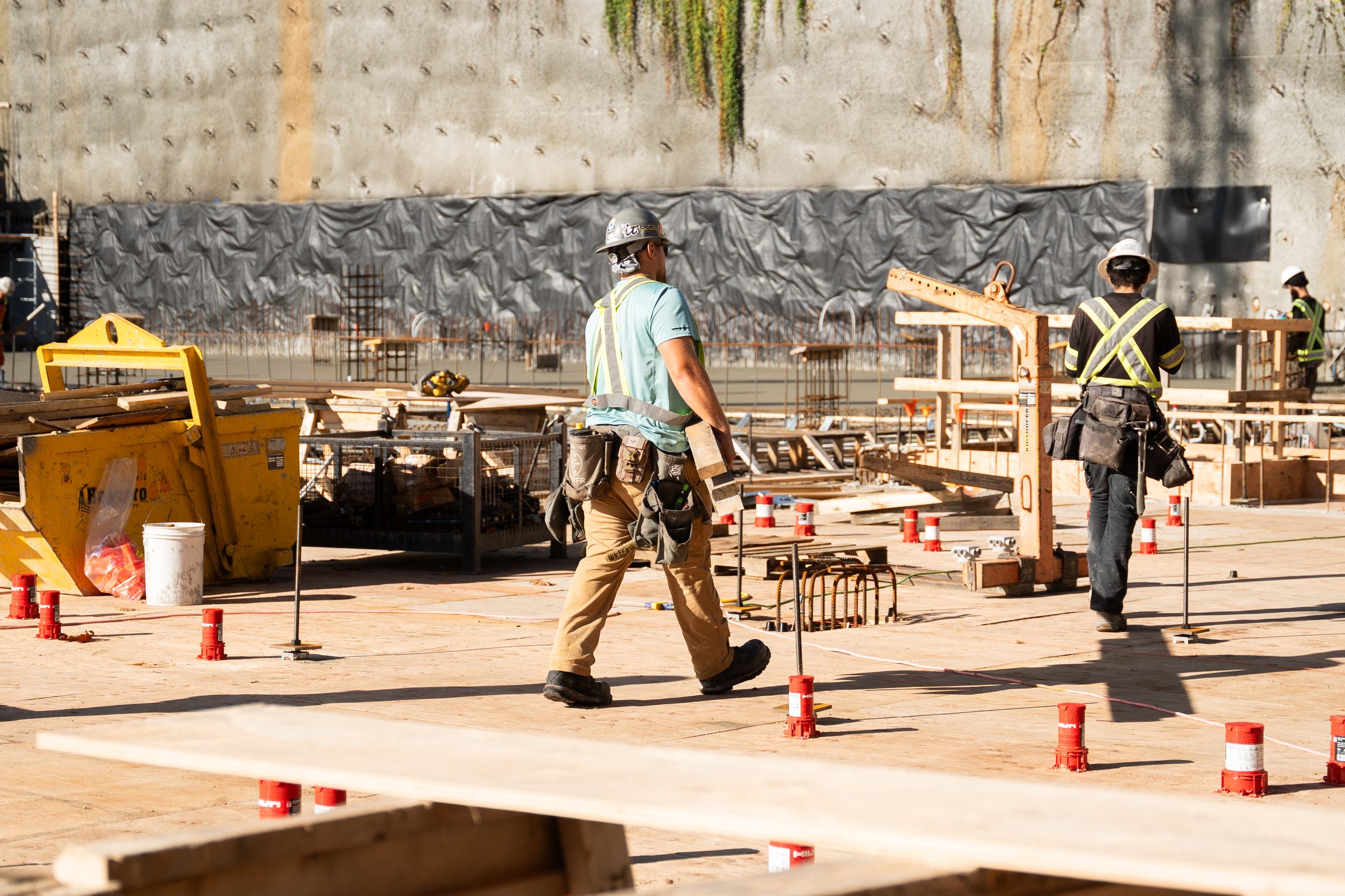 BC Legacy crew members working together on a parkade slab